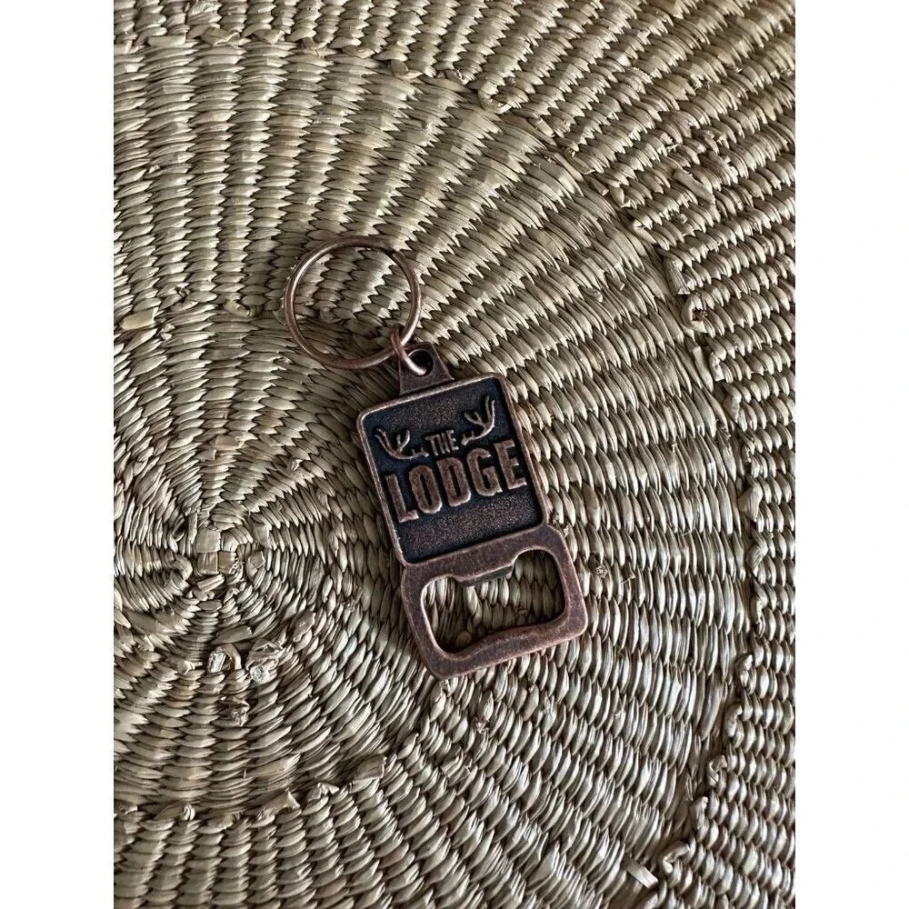 The Lodge metal bottle opener